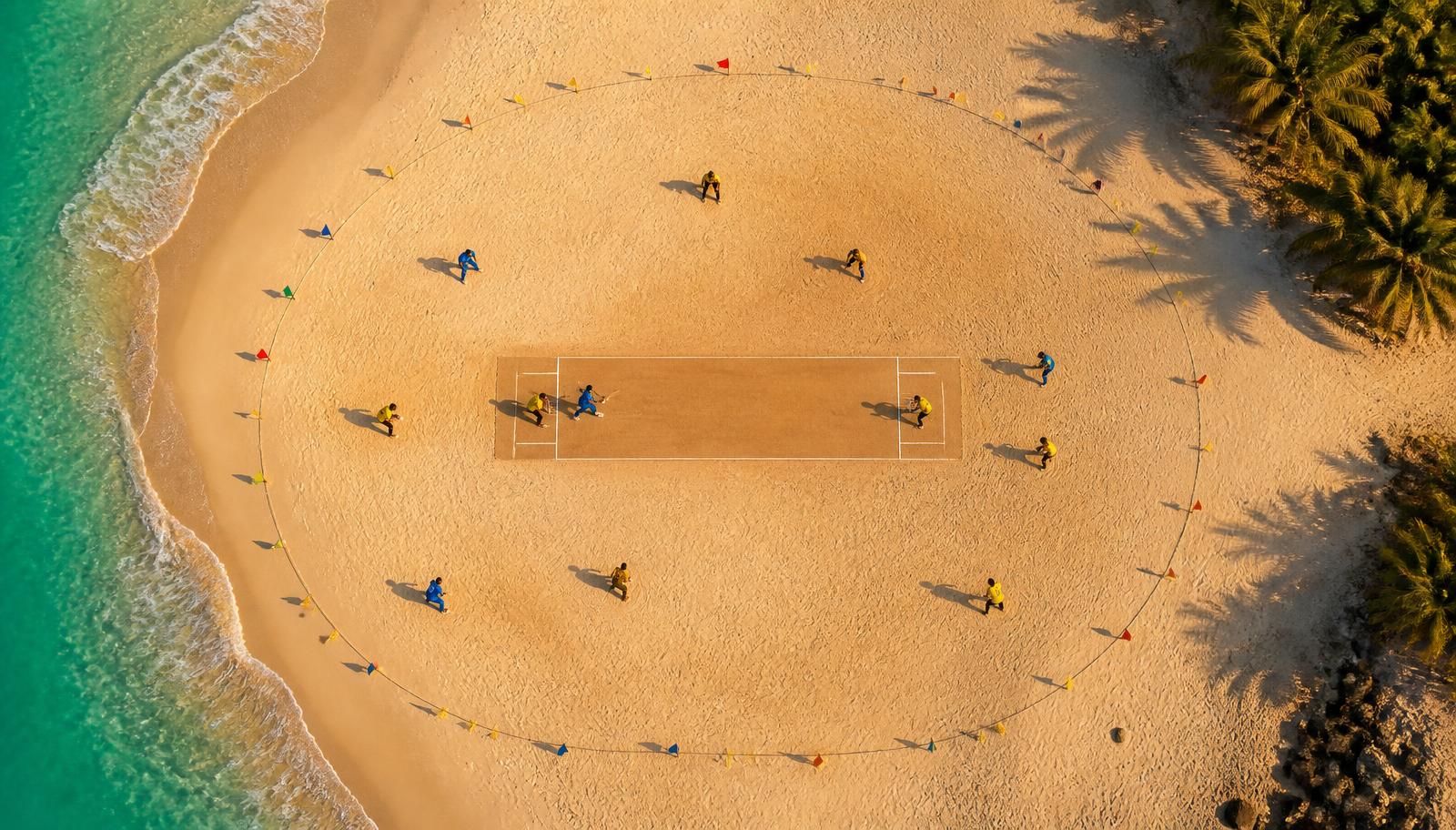 Aerial view of a beach cricket sand pitch beside the sea
